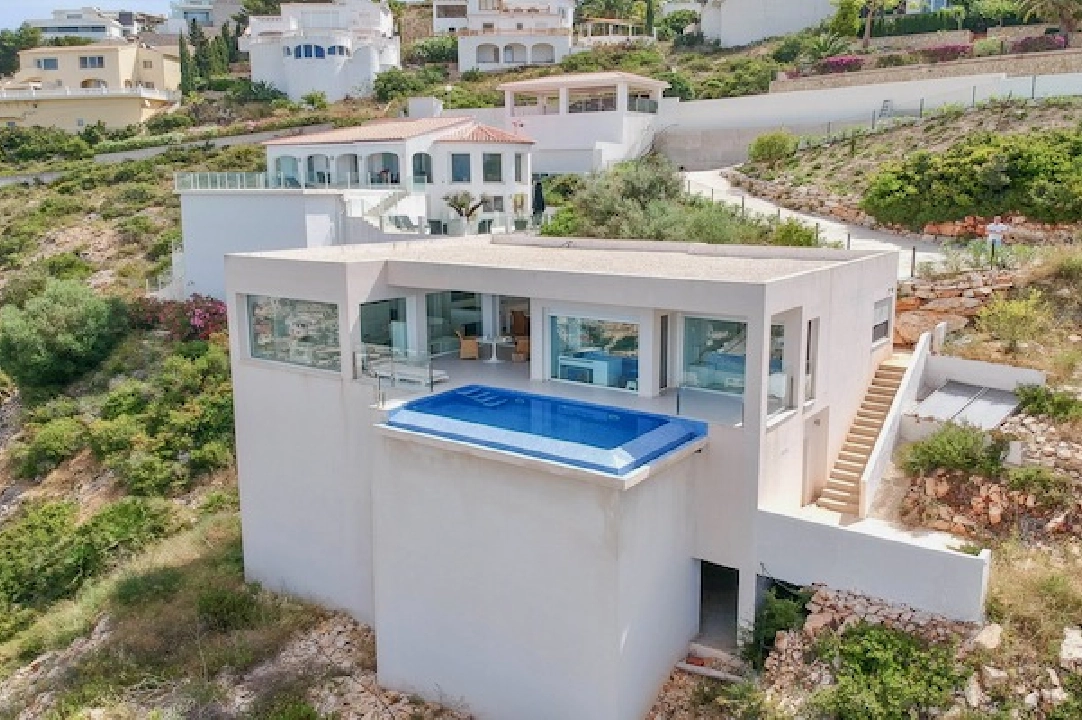 villa en Benitachell(La Cumbre del Sol) en venta, superficie 140 m², aire acondicionado, parcela 1395 m², 2 dormitorios, 2 banos, piscina, ref.: CA-H-1815-AMB-1